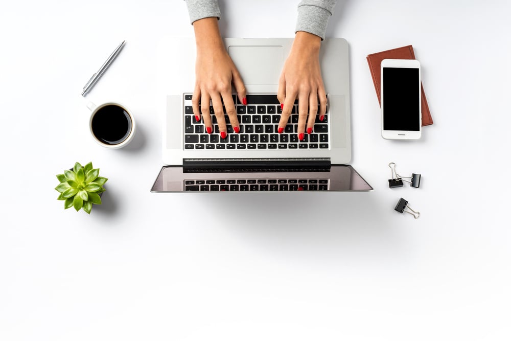 female hands working on a modern laptop